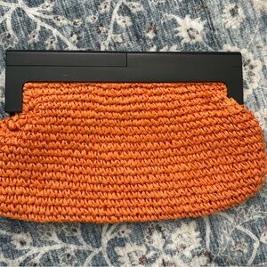 Elegant Orange Woven Clutch with Black Handle